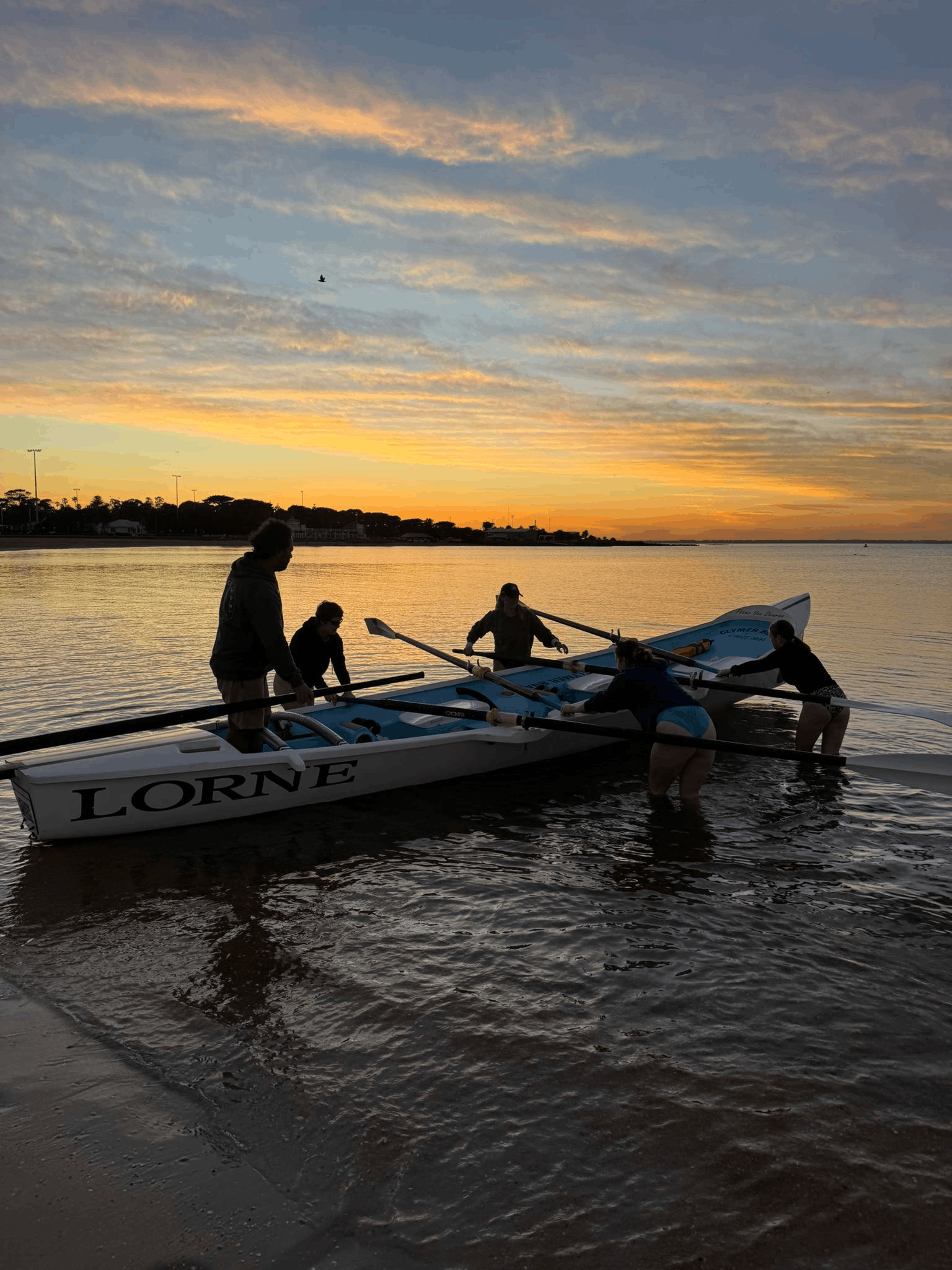 surfboat in the sunrise